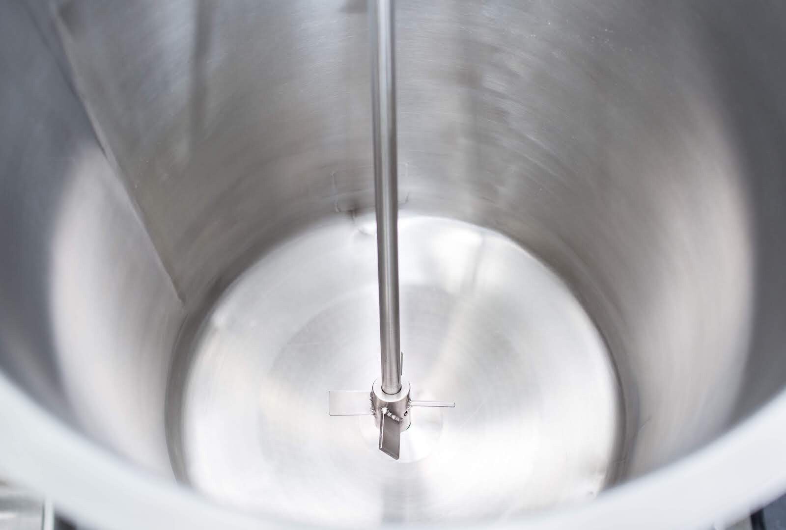 stainless steel impeller inside a mixing vessel